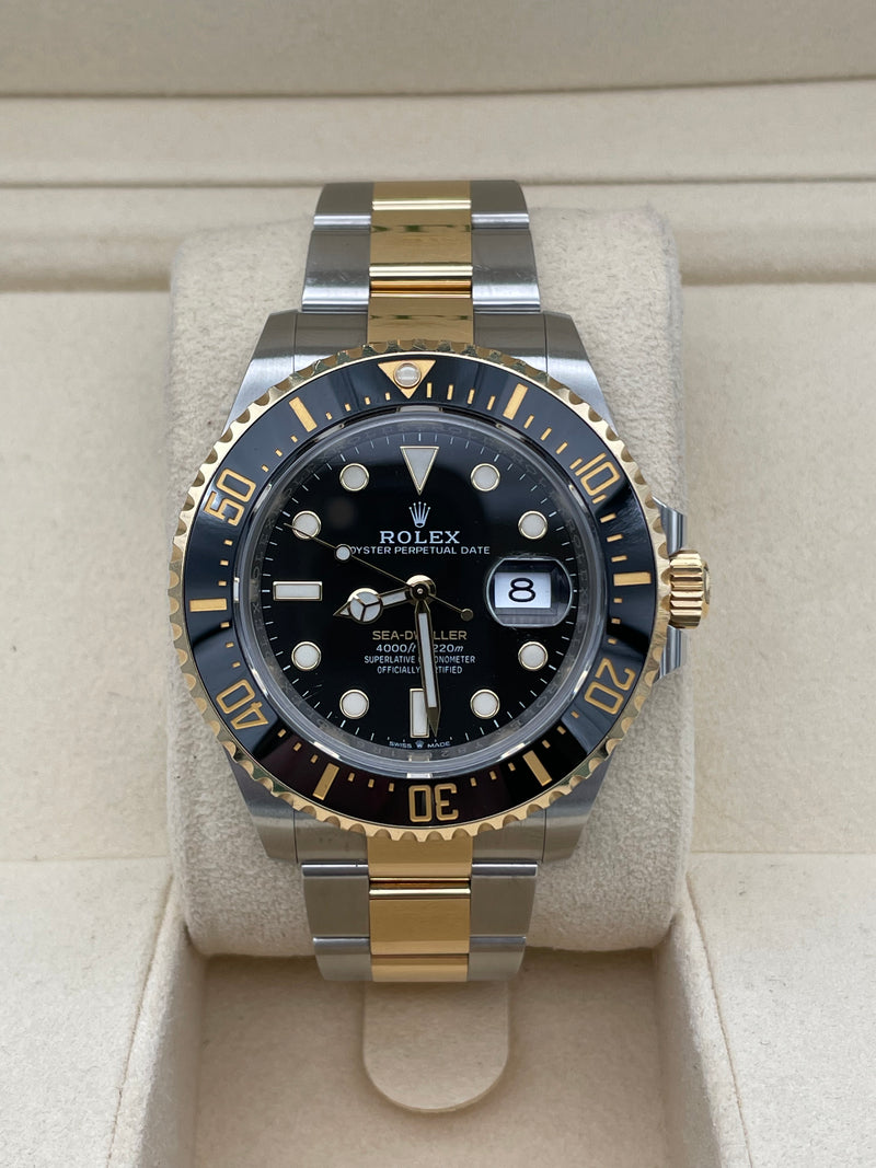 Rolex sea dweller hot sale black and gold