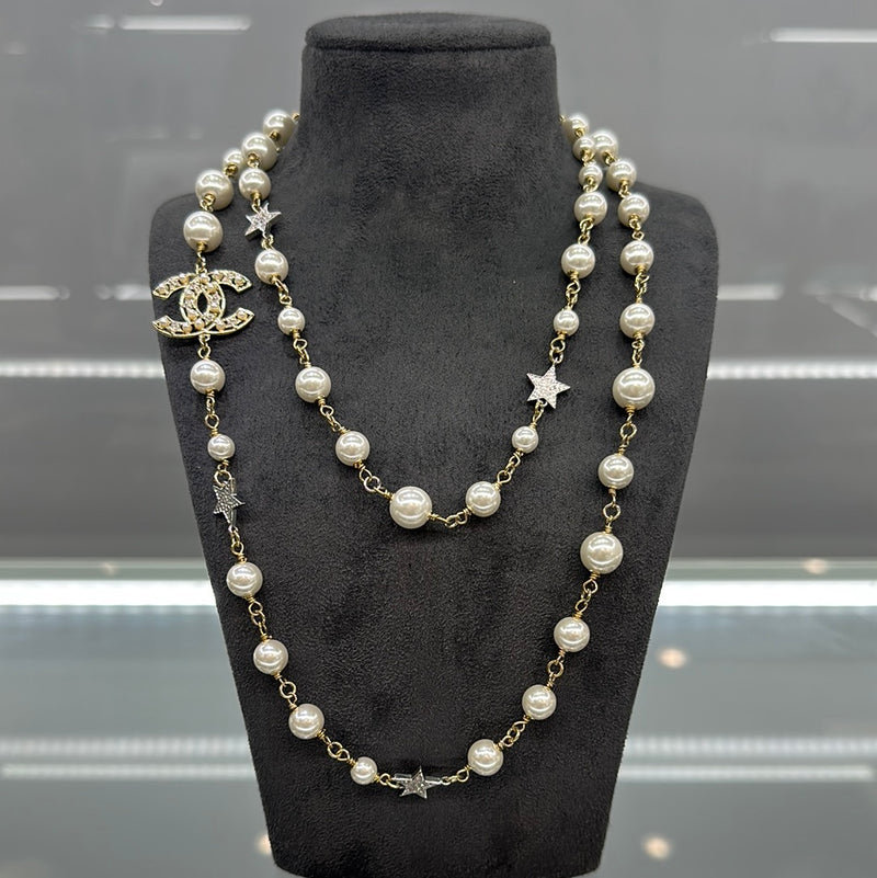 Chanel Classic Long Pearl Necklace with 5 CC Silver Crystal Logos at  1stDibs  chanel long pearl necklace chanel silver pearl necklace chanel  pearl necklaces